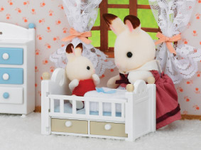 Sylvanian mother in kid's room taking care of her child